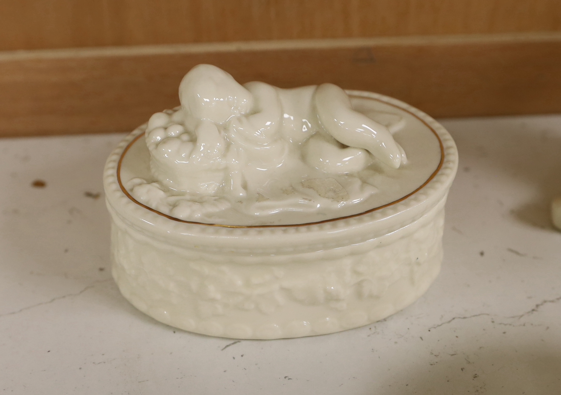 A quantity of Belleek ‘Clover’ pattern ceramics and a Belleek box and cover, tallest 18.5cm